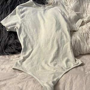 Skims off white (bone color) bodysuit, Size S